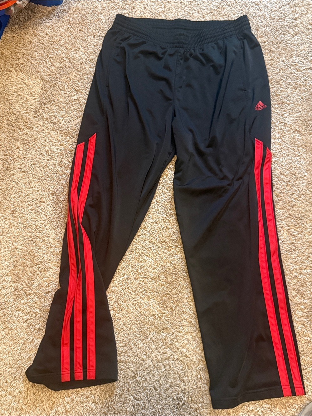 adidas Menβs Black Joggers with Red Side Stripes